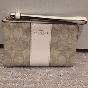 Coach Corner Zip Wristlet In Signature Canvas With Stripe